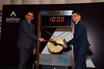 Dr.Aman Ashwin Desai and Mr.Rohan Ashwin Desai ringing the gong at the listing ceremony of Aether Industries at BSE.