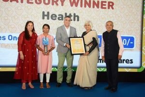 Ms Sarada Lingaraju (Second right), Hospice Administrator and Neha Rani Patel, Program Manager (Second left) receiving the award at the ceremony conducted by Americares India Foundation