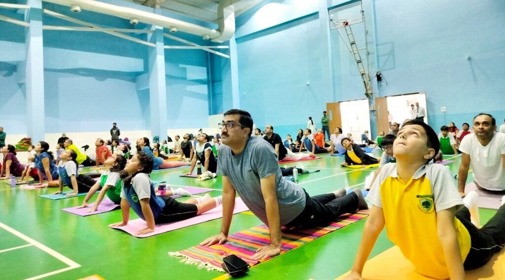 Parents - Child duo celebrate International Yoga Day at Greenwood High